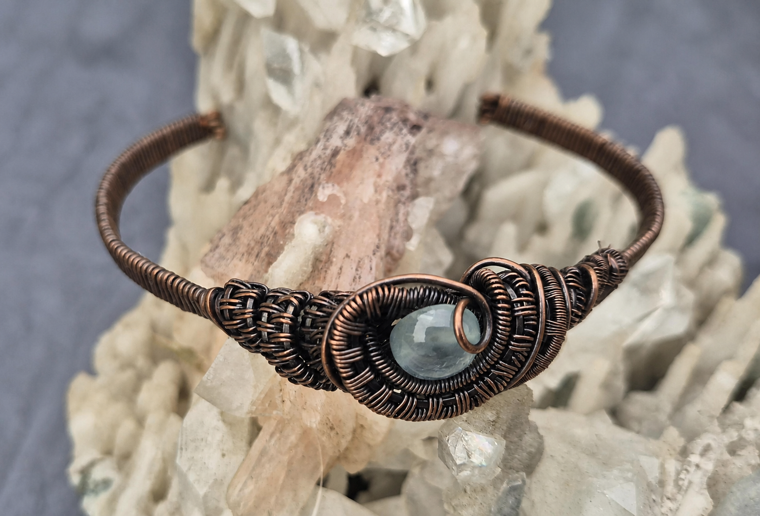 Blue chalcedony set into a hand-woven oxidised copper cuff