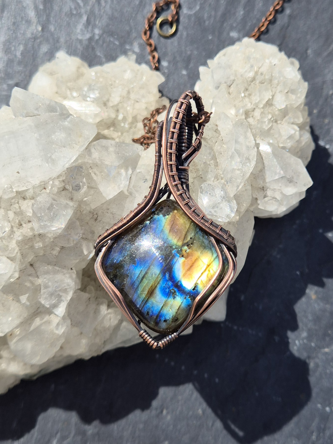 Labradorite Pendant photographed with mineral crystals